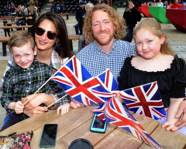 Andy Llewellwn and Billy, six and Elsie, 10, with Lara Gracia flying the flag for Britain.