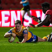 James McDonnell scores one of his four tries during Leeds Rhinos' 28-0 win at Salford Red Devils in April. Picture by Olly Hassell/SWpix.com.