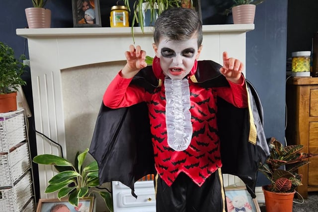 This very adorable little vampire was shared to us by Sarah Petre.