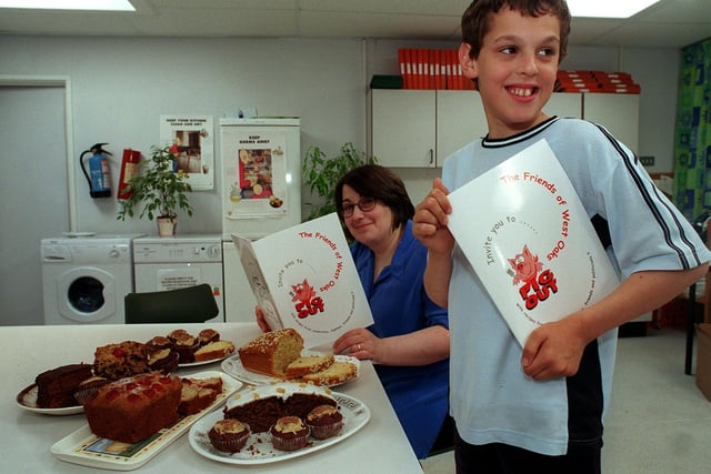 April 1999 and Hilary Dalton, vice chair of Friends of West Oaks School in Boston Spa, is pictured with pupil Matthew Shaw and money raising recipe books.