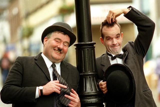 Jim McClure as Oliver Hardy and Gary Slade as Stan Laurel open a refurbished Morley market in September 1998.