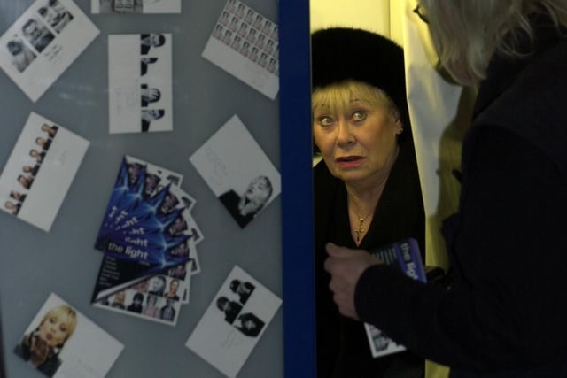 Yorkshire stars visited Reflect, an exhibition at The Light,, to have their pictures taken for a children's charity. Pictured is actress Liz Dawn needing help to operate the photo booth.