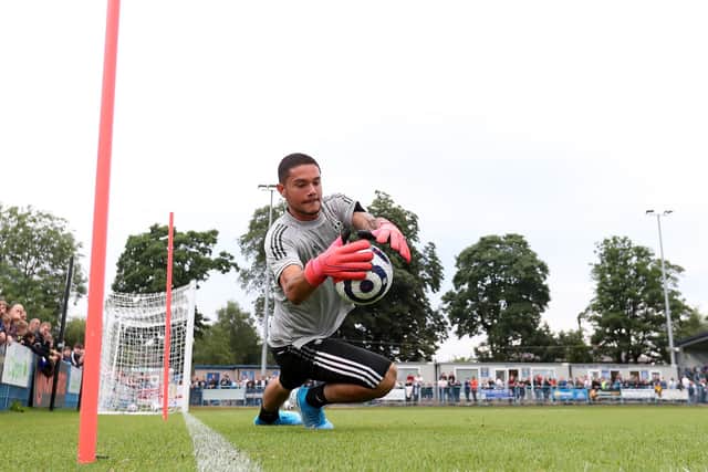 Elia Caprile of Leeds United warms up prior to the Pre-Season Friendly match between Guiseley and Leeds United at Nethermoor Park on July 27, 2021 in Guiseley, England. (Photo by George Wood/Getty Images)