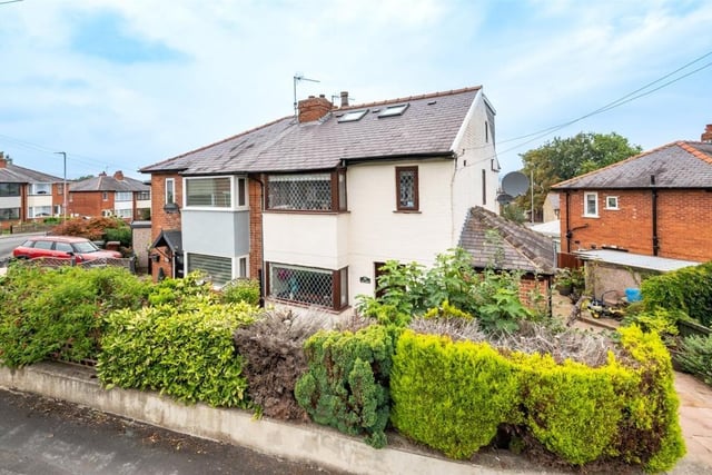 This extended semi-detached house in Otley has four bedrooms, three bathrooms, two reception rooms and a kitchen diner. It is within walking distance of Menston Train Station and Otley town centre, and has a beautiful garden with Indian stone work and a concrete outhouse.