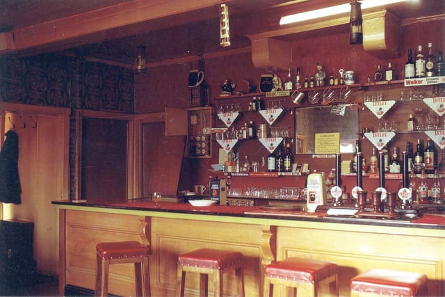The bar area inside The Cardigan Arms  on Dewsbury Road in February 1971. The photograph was taken not long before the Cardigan Arms was demolished in 1972 for road widening.