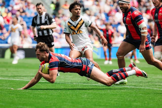 Josh Rourke scores for Wakefield Trinity during their Magic Weekend hammering of Castleford Tigers at Hill Dickinson Stadium in Liverpool. Picture by Alex Whitehead/SWpix.com.