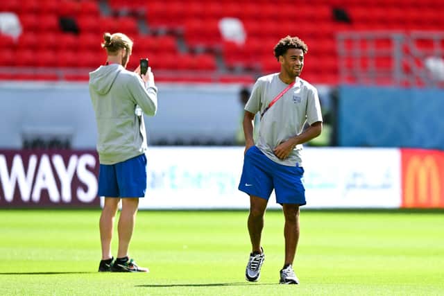 USA's Tyler Adams (R) walks on the ground during a familiarization visit at the Ahmad Bin Ali Stadium in Al-Rayyan, west of Doha on November 17, 2022, ahead of the Qatar 2022 World Cup football tournament. (Photo by Patrick T. FALLON / AFP) (Photo by PATRICK T. FALLON/AFP via Getty Images)