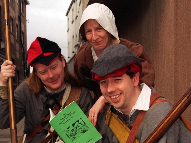 Pictured at Pontefract Library in March 1997 with a new book, The First and Second Sieges of Pontefract Castle, are Parliamentarian members of the English Civil War Society, Paul Cramer (left) and Derek Pitman with book editorAlison Walker.