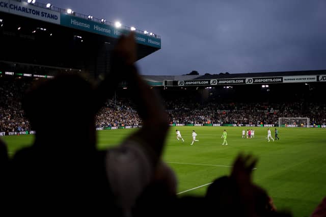 LEEDS, ENGLAND - AUGUST 18: Fans of Leeds United show their support prior to the Sky Bet Championship match between Leeds United and West Bromwich Albion at Elland Road on August 18, 2023 in Leeds, England. (Photo by George Wood/Getty Images)