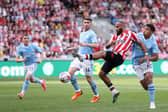 PRICEY PURHASE: Shea Charles, right, on his Manchester City debut against Brentford in May's season finale. Photo by Alex Pantling/Getty Images.