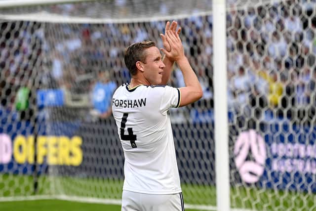 BRISBANE, AUSTRALIA - JULY 17: Adam Forshaw of Leeds United thanks the Leeds fans after the 2022 Queensland Champions Cup match between Aston Villa and Leeds United at Suncorp Stadium on July 17, 2022 in Brisbane, Australia. (Photo by Bradley Kanaris/Getty Images)