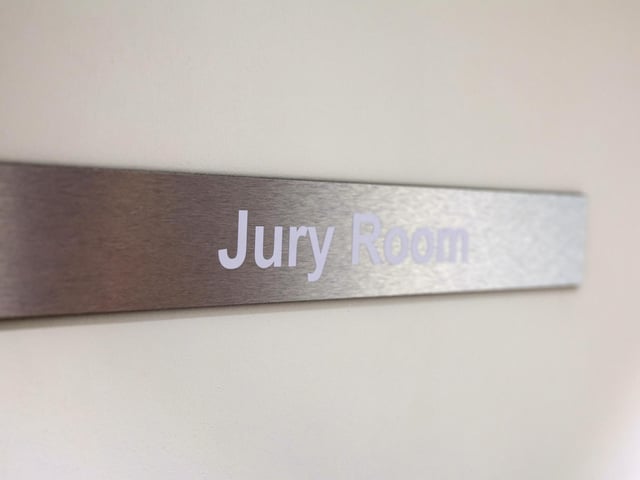 The building features two courts fitted with systems to allow some witnesses to attend hearings remotely.