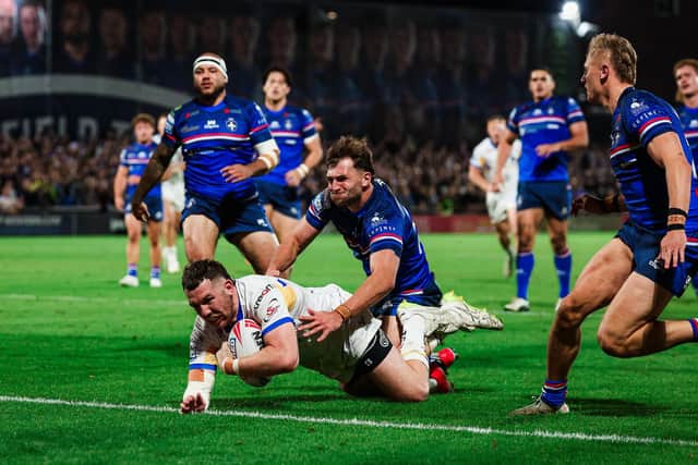 Cameron Smith scores for Leeds Rhinos in their 24-22 win at the club he'll join next year, Wakefield Trinity. Picture by Alex Whitehead/SWpix.com
