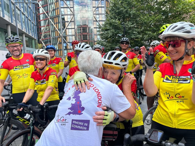 Jean Leadbeater hugs Kath Lyons at the finish line in London.
