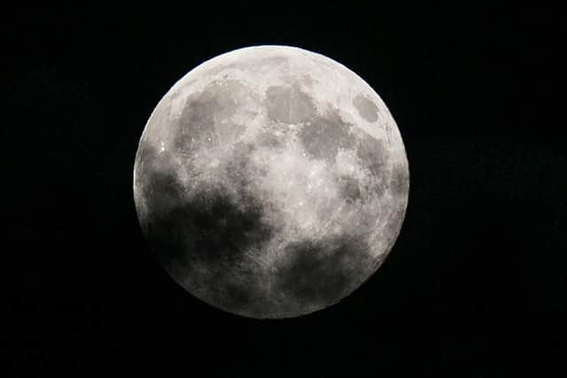 The supermoon rises above Glastonbury. (Pic credit: Matt Cardy / Getty Images)