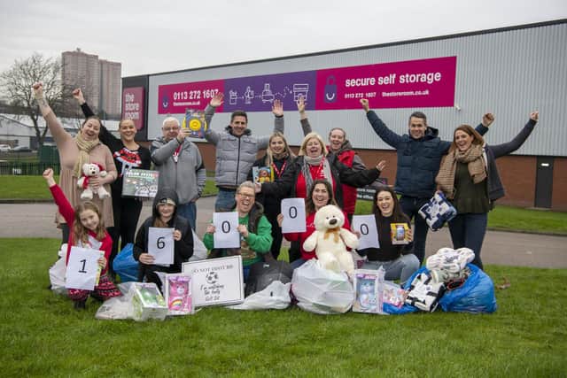 Staff and volunteers celebrate helping 16,000 children through this year's Mission Christmas toy appeal.  Picture: Tony Johnson