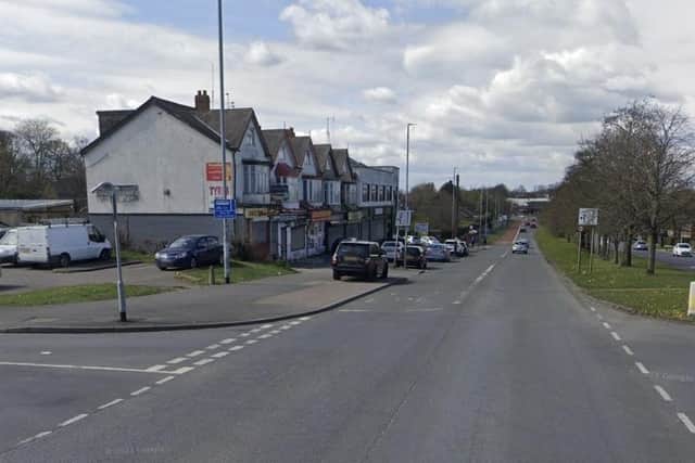 Fire service personnel released the woman and she was taken to hospital by ambulance.