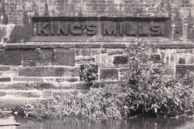 King's Mill, the stone set in the wall by the side of the River Aire below the social centre.