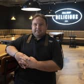 Michael Chappell starts his role in the cafe of the new Marks and Spencer 'megastore' in Leeds. Photo: Simon Hulme