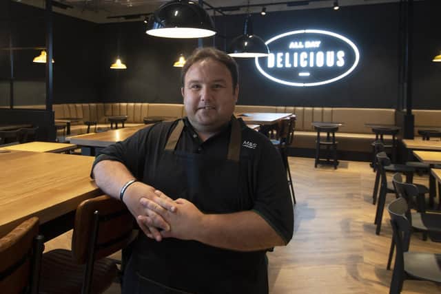 Michael Chappell starts his role in the cafe of the new Marks and Spencer 'megastore' in Leeds. Photo: Simon Hulme