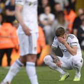 DEVASTATED: Leeds United captain Liam Cooper after Sunday's 4-1 defeat at home to Tottenham and relegation for the Whites. Photo by OLI SCARFF/AFP via Getty Images.