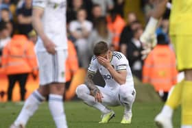 DEVASTATED: Leeds United captain Liam Cooper after Sunday's 4-1 defeat at home to Tottenham and relegation for the Whites. Photo by OLI SCARFF/AFP via Getty Images.