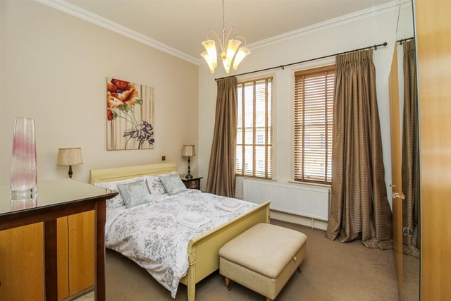 The large windows admit plenty of light in to this lovely double bedroom.