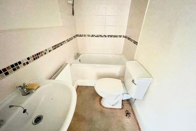 Here is the bathroom, which sits on the first floor of the Carlton Street property. A white suite comprises bath, wash hand basin and low-flush WC.