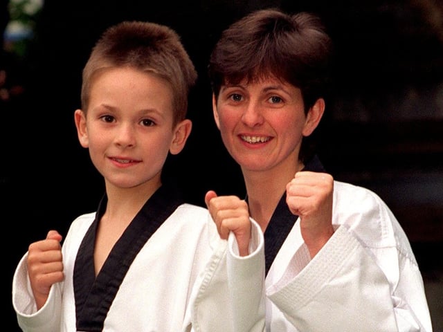 Pontefract's Helen Smith next to her son Jonathan  who have both gained black belts in Taekwondo.