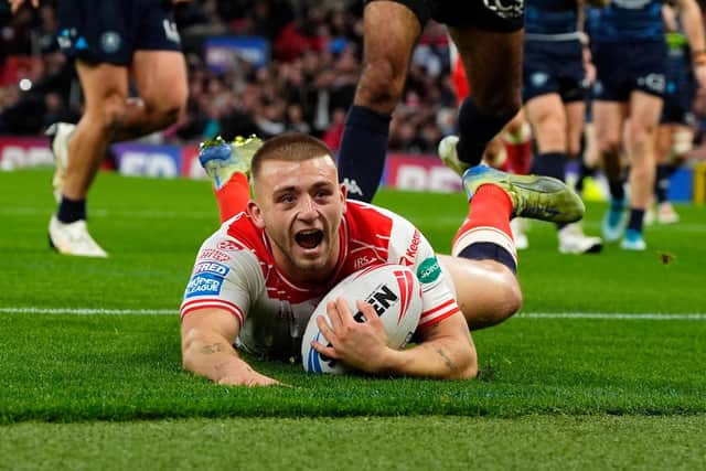 Hull KR's Mikey Lewis scores the first try of the Grand Final against Wigan Warrtiors at Old Trafford. Picture by Olly Hassell/SWpix.com.