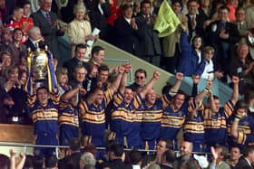 The long wait is finally over as Iestyn Harris becomes the first Leeds captain in 21 years to lift the Challenge Cup.
