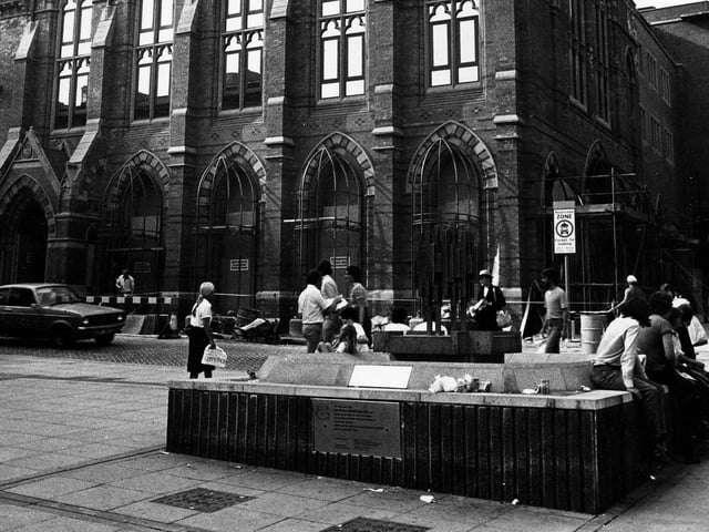 The Church Institute was formed in 1857, the foundation stone for this building was laid in 1866. It is now 'La Senza' shop. This is Albion Place, the entrance is from Lands Lane, on the right. In the foreground is a fountain, it was part of the Lands Lane precinct scheme, an early move to provide traffic free shopping areas.
