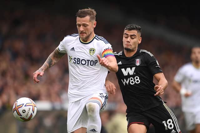 CALL: For Liam Cooper, left, to return against Fulham, the Leeds United captain pictured battling it out with Andreas Pereira in October's clash against the Cottagers at Elland Road. Photo by Stu Forster/Getty Images.