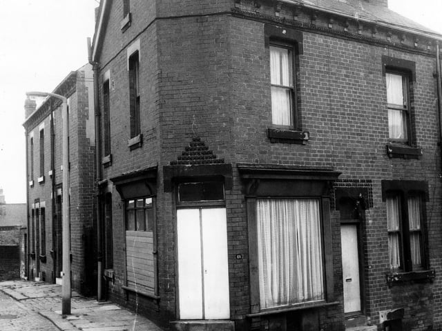 On the left of the image from May 1971 is Gayle's Place with Greenmount Street at the corner. The window on the left of this shop front is boarded over.