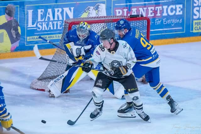 WE MEET AGAIN: Harry Gulliver and Balint Pakozdi tangle up one another on an earlier meeting beteween Milton Keynes and Leeds this season. Picture courtesy of Tony Sargent.