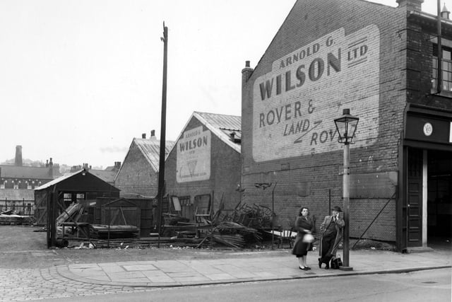 Sheepscar Street (North) pictured in July 1954. In focus are the premises of 'Ableson's Timber Merchants', and 'Arnold G.Wilson Ltd, Distributors of Alvis'.
