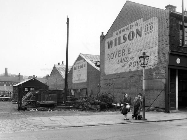 Sheepscar Street (North) pictured in July 1954. In focus are the premises of 'Ableson's Timber Merchants', and 'Arnold G.Wilson Ltd, Distributors of Alvis'.