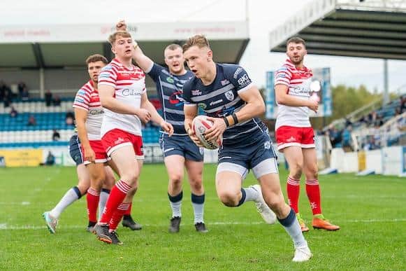 Leeds Rhinos' England centre Harry Newman had a successful spell on loan at Featherstone Rovers early in his career. He is seen scoring against Leigh in 2018. Picture by Allan McKenzie/SWpix.com.
