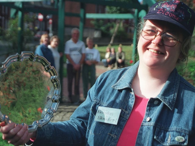 Beeston in Bloom volunteers  with the Yorkshire in Bloom trophy in October 2002. Pictured is Sheila Stuttard.