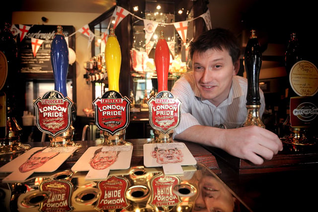 Landlord of the Scarborough Hotel, Leeds, Toby Flint with his election beer pumps, in 2010.