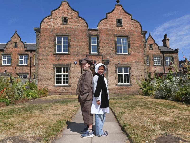 School children in period dress outside the Residents Block at the refurbished Ripon Workhouse Museum. (Picture Gerard Binks)