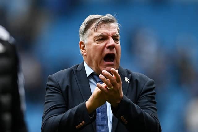 Big Sam applauds the away support following Leeds' defeat at the Etihad Stadium last weekend (Pic: Getty)