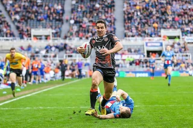 Tom Holmes scores for Castleford Tigers against Leeds Rhinos at the 2017 Super League Magic Weekend. Picture by Alex Whitehead/SWpix.com.