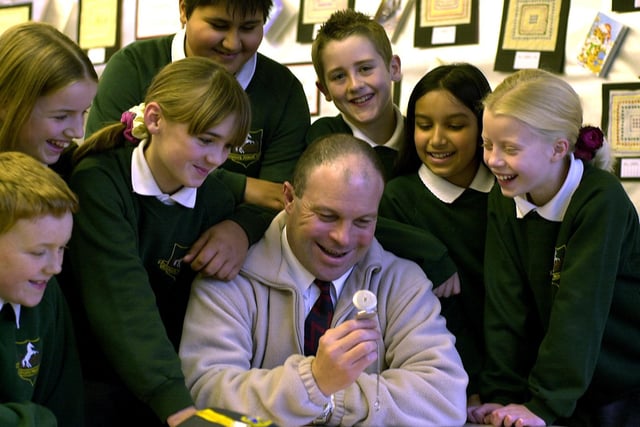 Billy Baxter, who held the land speed record for a blind person, is pictured showing his braille watch to pupils at Broadgate Primary School in December 2003.