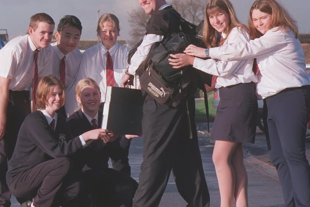 November 2000 and Garforth Community College teacher Nick Hayman ended up loaded down with baggage when he volunteered to be a slave for a day for these Year 11 students in aid of Children in Need.