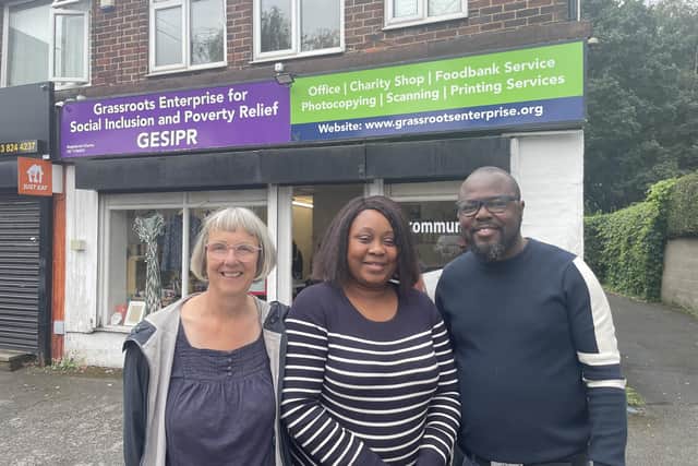 From left, volunteer Barbara Davies with Mary and Cecil Nelson, who run the Grassroots Enterprise charity shop and food bank in Kirkstall which feeds at least 150 people a week. Photo: National World.