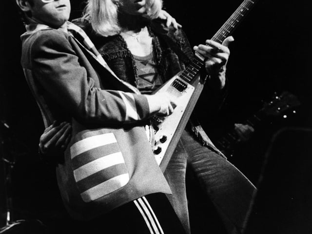 "Fans stood, cheered and sang long, and loud, danced in the aisles and unanimously acclaimed his masterful blend of musicianship and eccentricity."