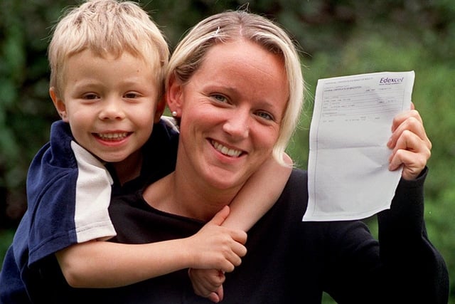 Beeston's Angie Alderson celebrates with son Oliver after passing three A-levels in August 1999.