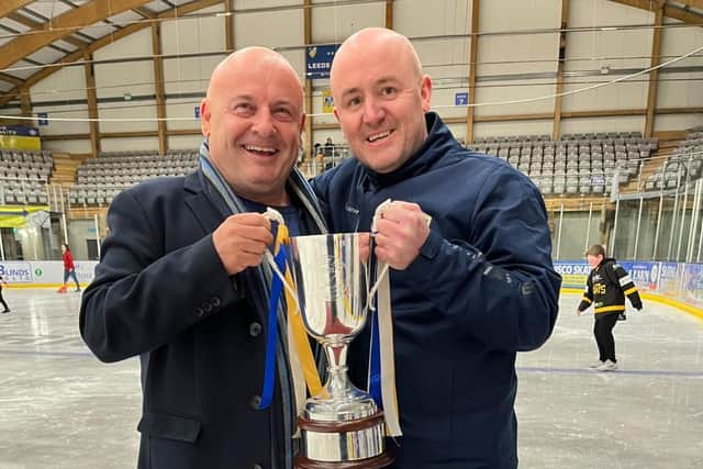 SUCCESS: Leeds Knights' owner Steve Nell (left) pictured with the NIHL National league trophy with head coach Ryan Aldridge.