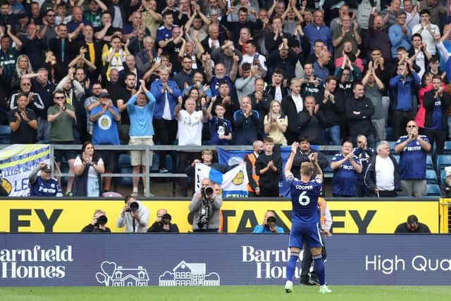 BURNLEY, ENGLAND - AUGUST 29: Liam Cooper of Leeds United interacts with the crowd following the Premier League match between Burnley and Leeds United at Turf Moor on August 29, 2021 in Burnley, England. (Photo by George Wood/Getty Images)